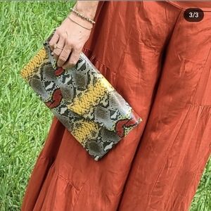 Snake print clutch